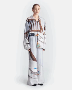 Nanushka Milon - Printed Flared Silk Twill Pants - Poppyseed Cake