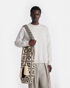 Nanushka Wayuu Symbol Maxi - Crocheted Bucket Bag - Kopjafa Black/Creme -Nanushka Fashion Store NW24FWBG17699 BUCKET BAG ELONGATED KOPJAFA BLACK CREME CROCHET 01